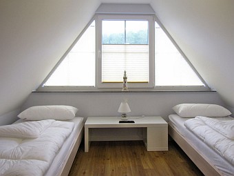 Ein Schlafzimmer im ausgebauten Spitzboden